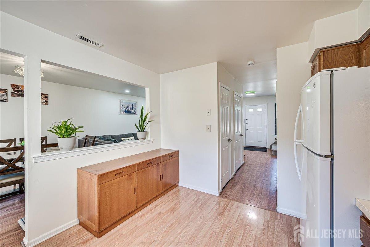 602 Maplecrest Road Edison, NJ 08820 - Photo 19 of 42 a kitchen with stainless steel appliances a refrigerator and a stove