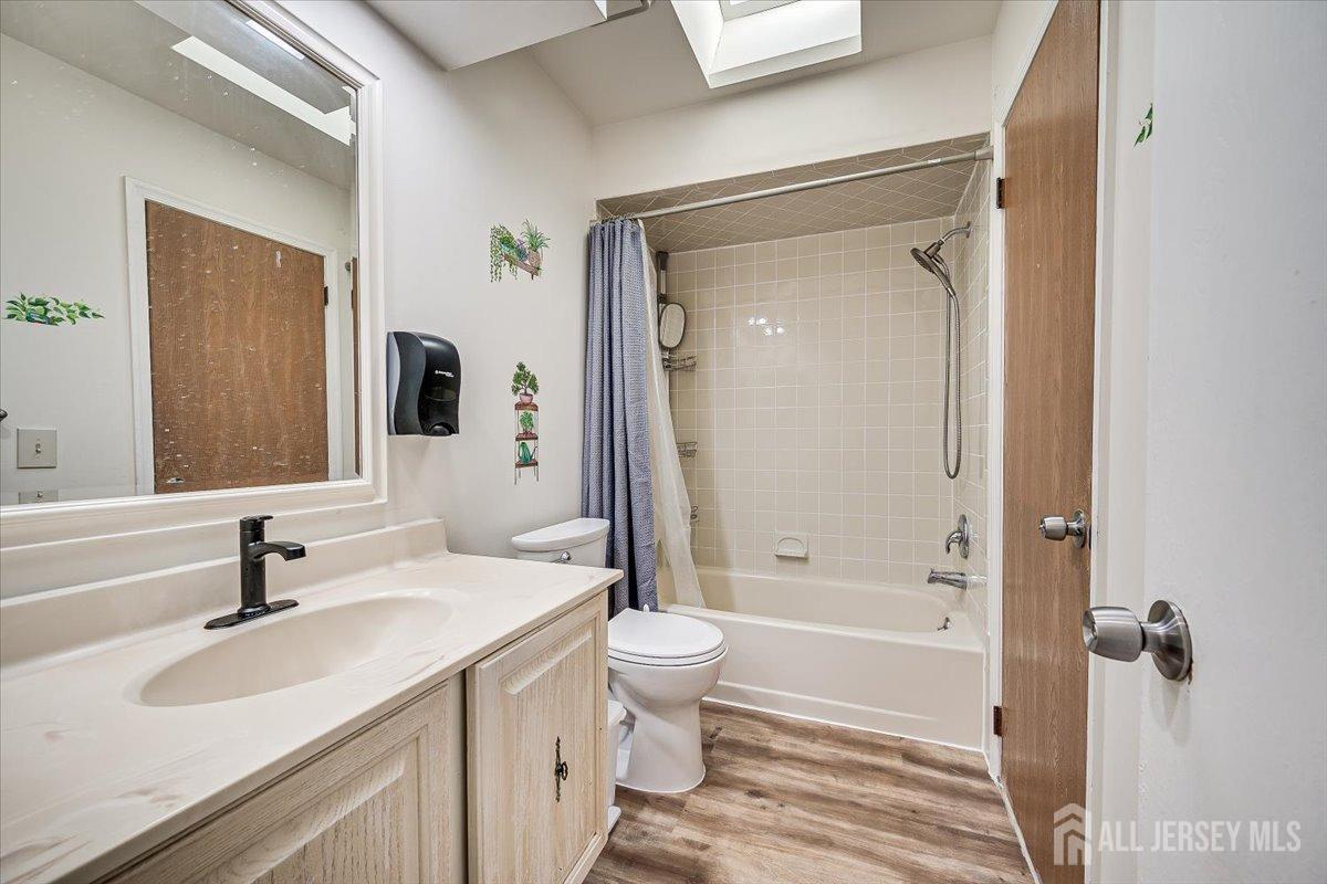 602 Maplecrest Road Edison, NJ 08820 - Photo 28 of 42 a bathroom with a sink a toilet and shower