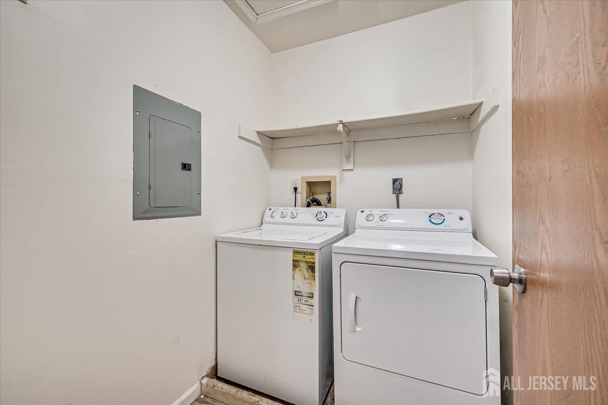 602 Maplecrest Road Edison, NJ 08820 - Photo 32 of 42 a utility room with dryer and washer