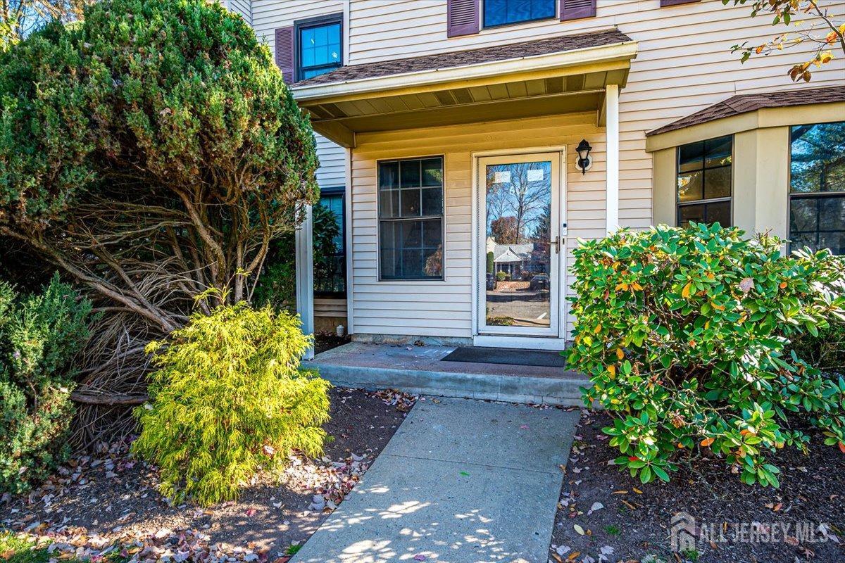 602 Maplecrest Road Edison, NJ 08820 - Photo 5 of 42 a front view of a house with garden