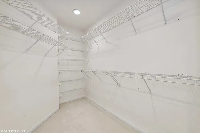 a view of a room with racks on the wall