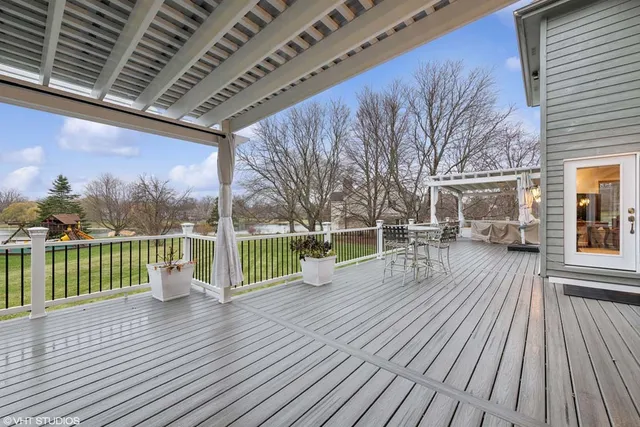 a view of a deck with wooden floor and outdoor space