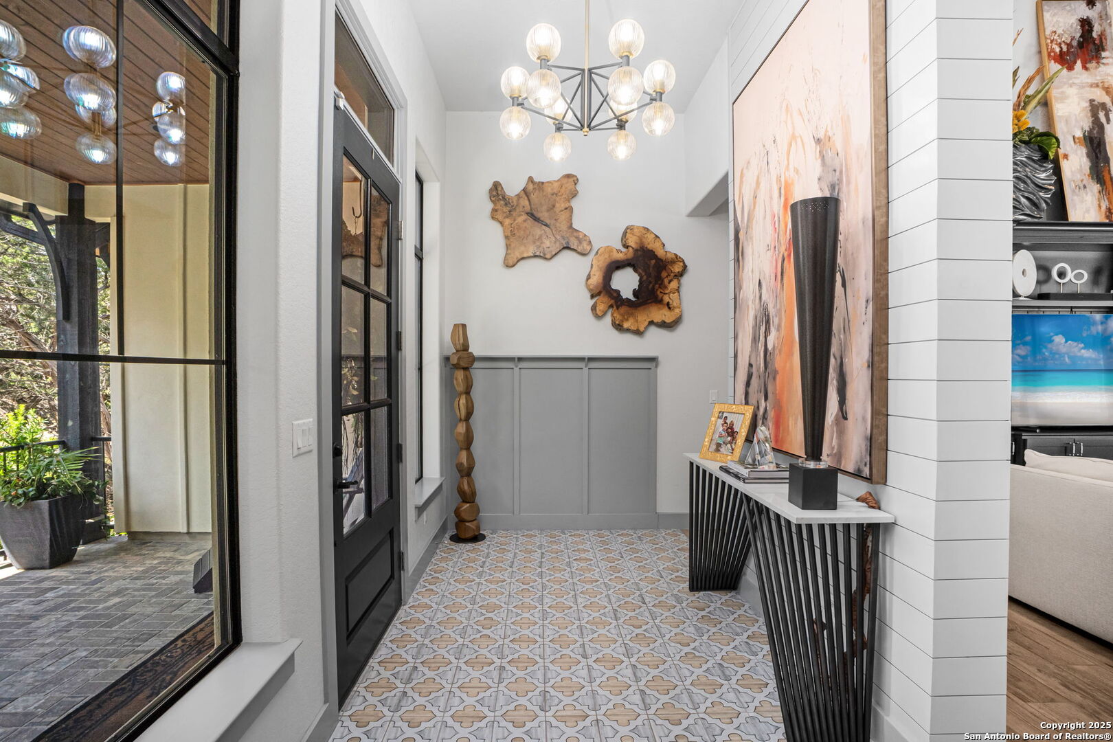 2016 Brunello New Braunfels, TX 78132 - Photo 11 of 53 a view of a hallway with paintings on the wall