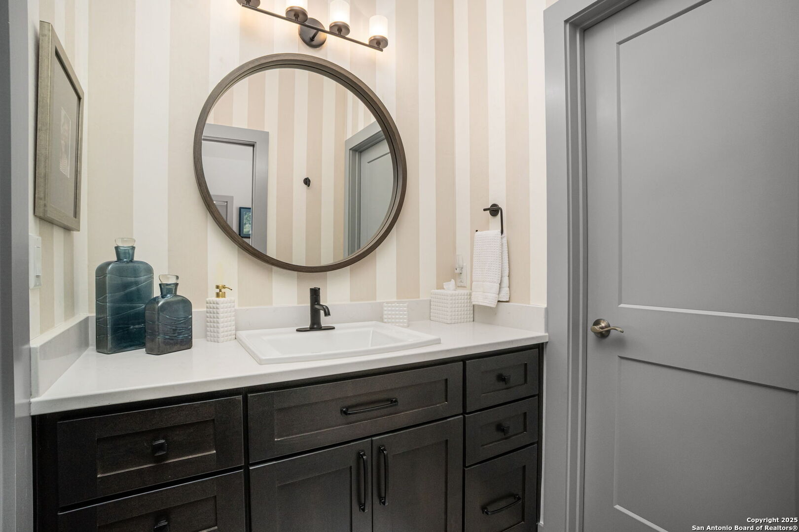 2016 Brunello New Braunfels, TX 78132 - Photo 35 of 53 a bathroom with a sink and a mirror