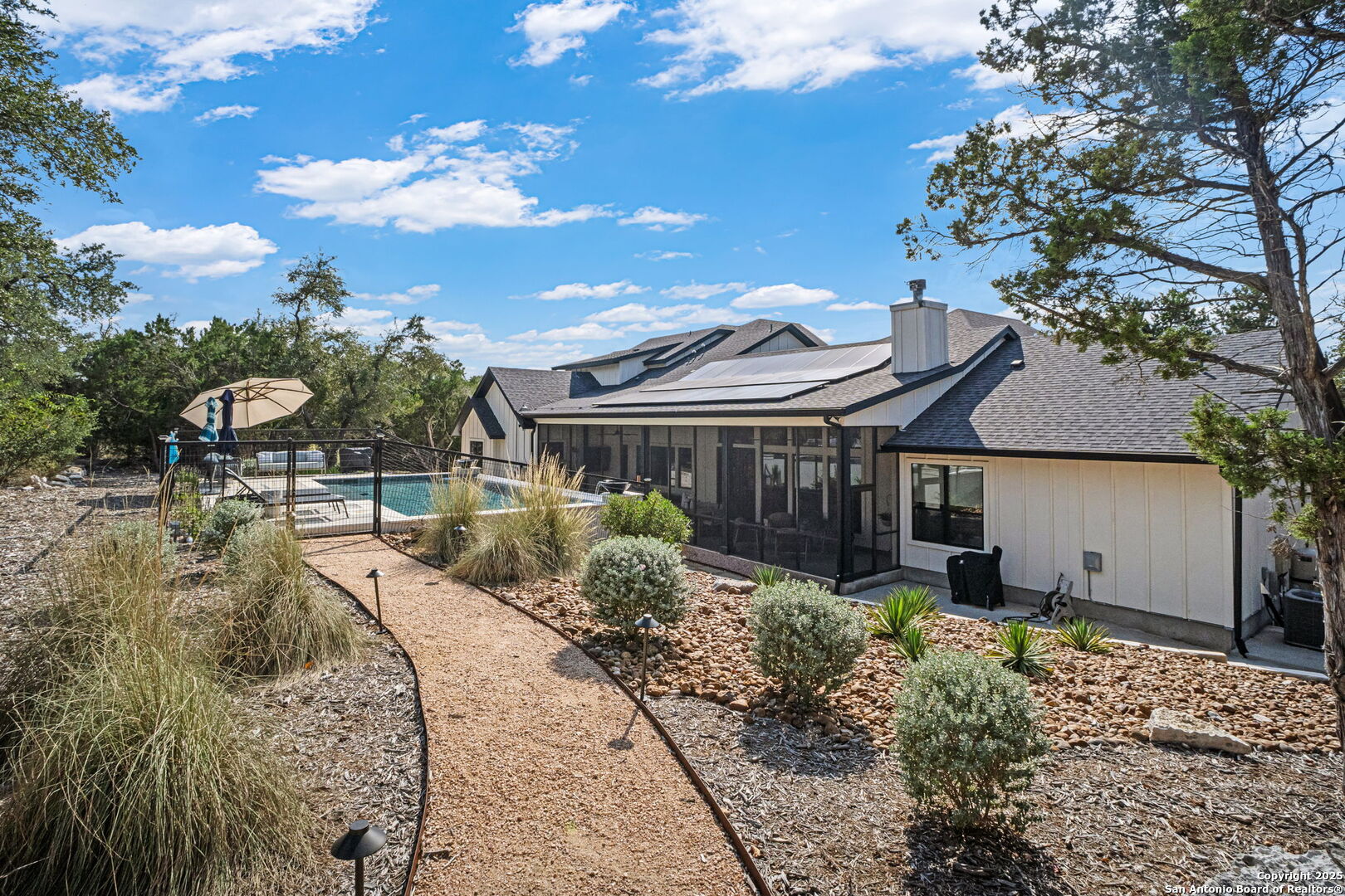 2016 Brunello New Braunfels, TX 78132 - Photo 44 of 53 a front view of house with a garden
