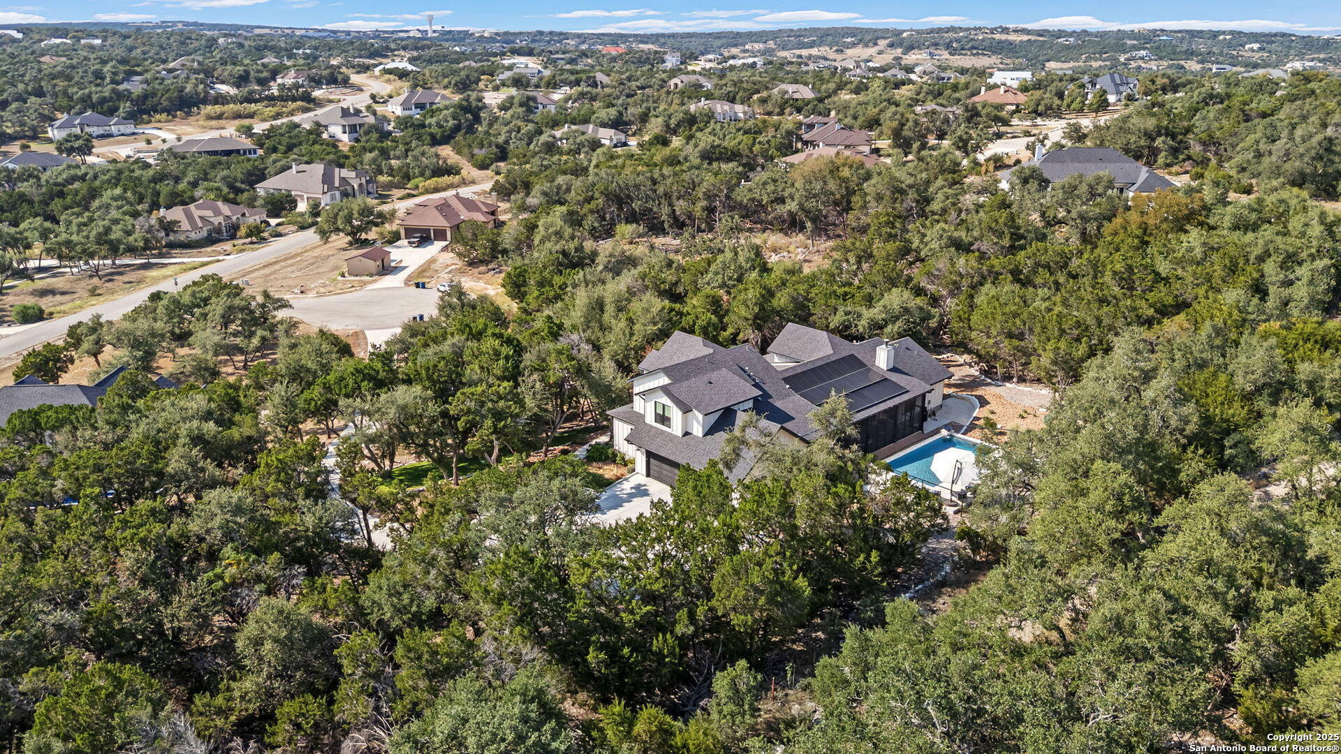 2016 Brunello New Braunfels, TX 78132 - Photo 46 of 53 an aerial view of residential house with outdoor space and trees