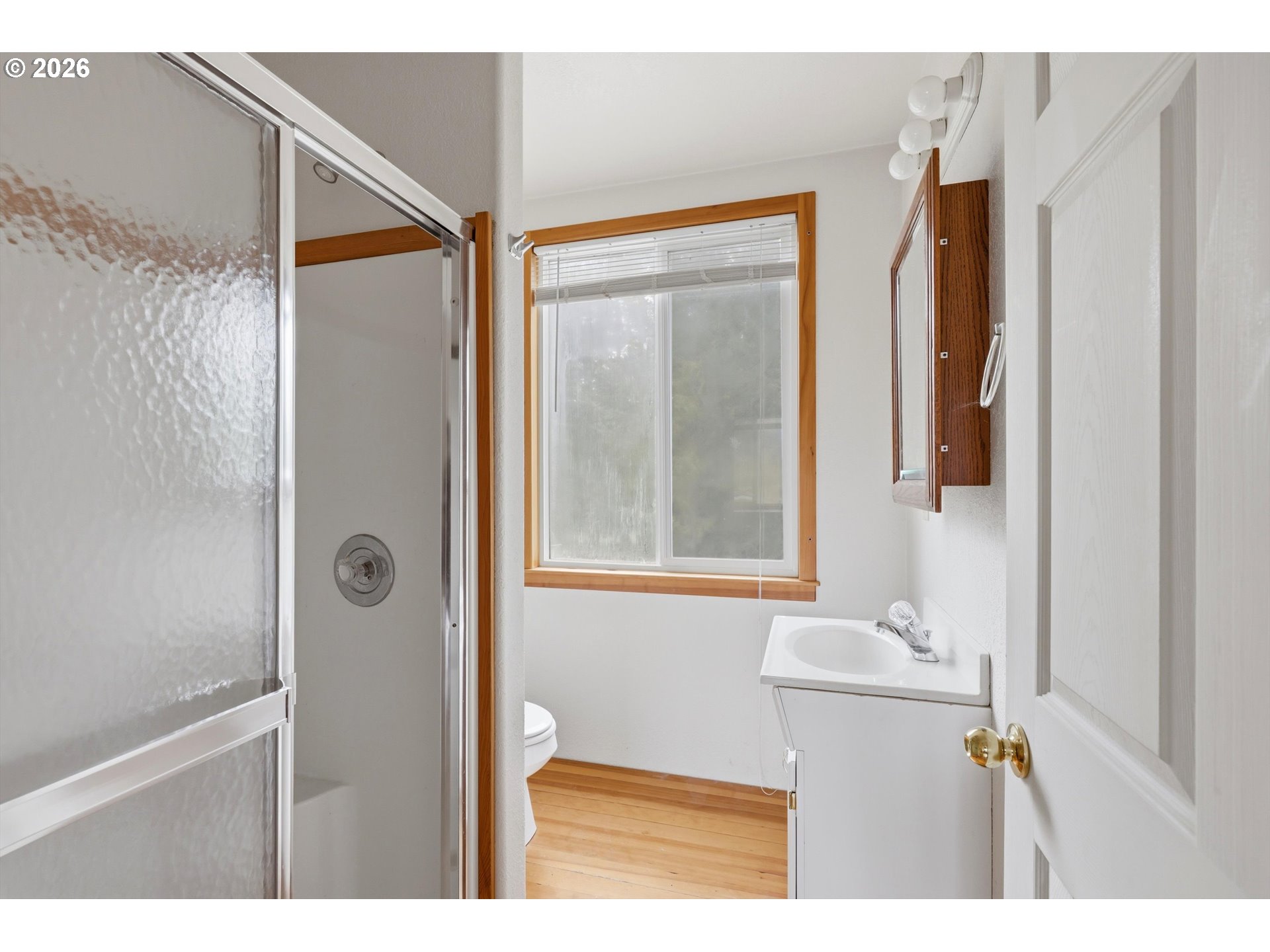 82320 Bay Road Seaside, OR 97138 - Photo 17 of 47 a bathroom with a toilet sink and shower