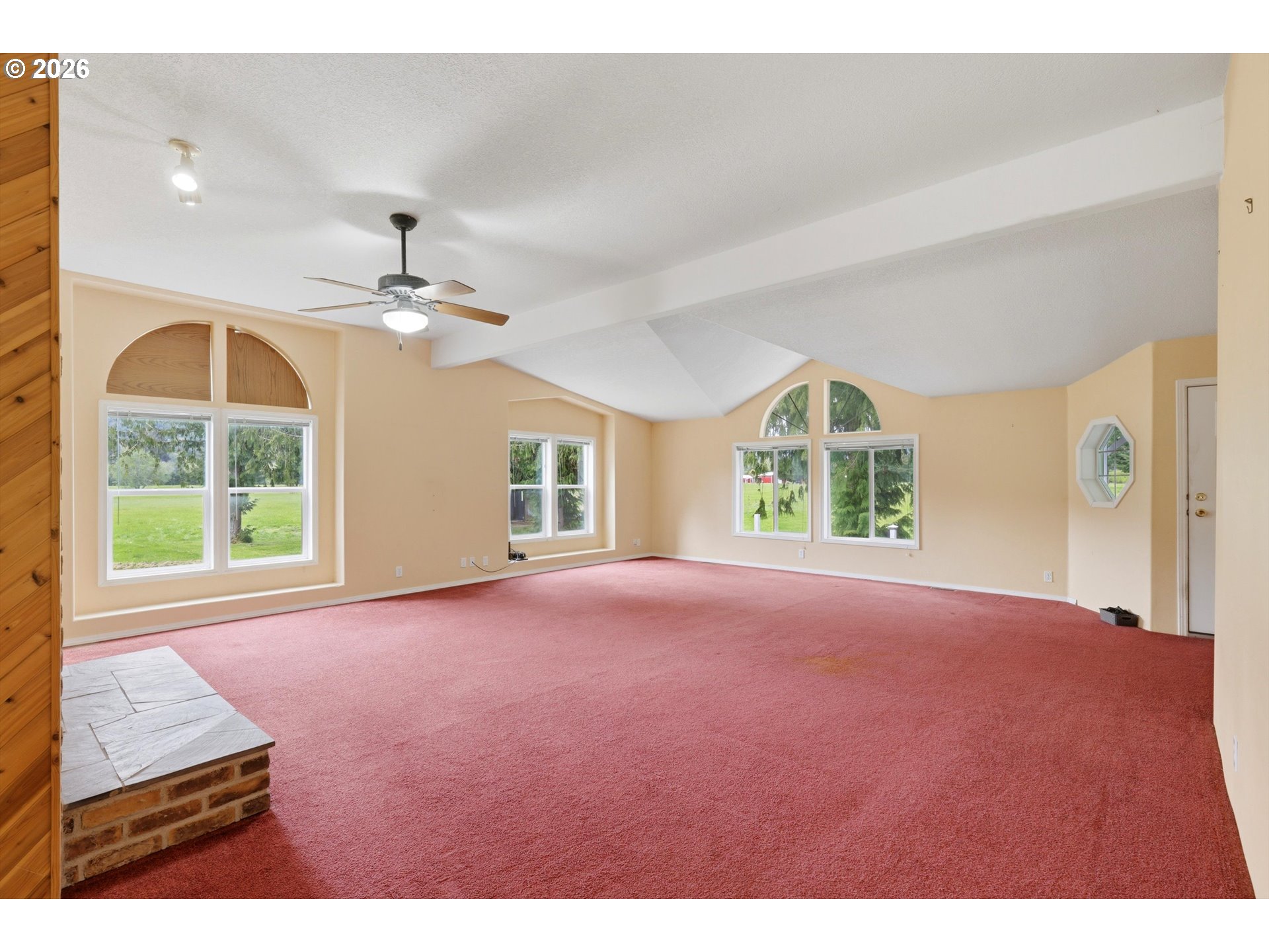82320 Bay Road Seaside, OR 97138 - Photo 4 of 47 a view of an empty room with a window