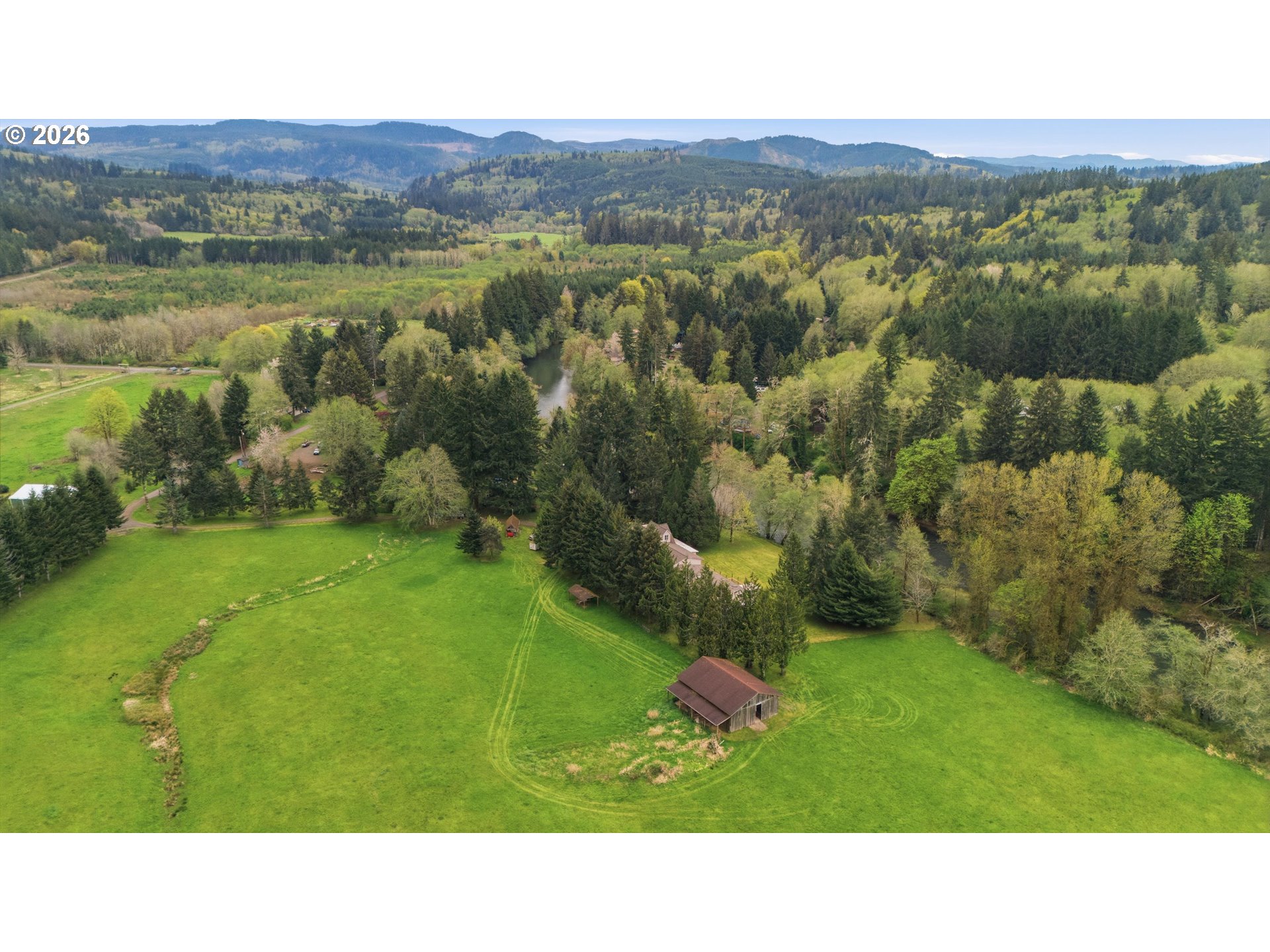 82320 Bay Road Seaside, OR 97138 - Photo 42 of 47 a open area with mountains in the background