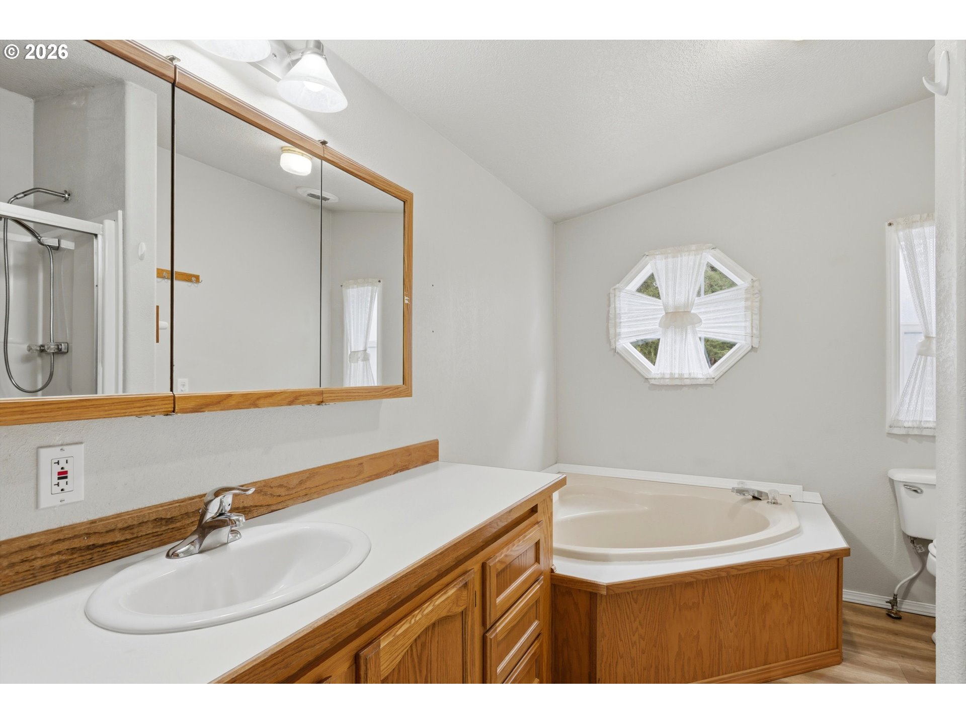 82320 Bay Road Seaside, OR 97138 - Photo 9 of 47 a bathroom with a sink and a mirror