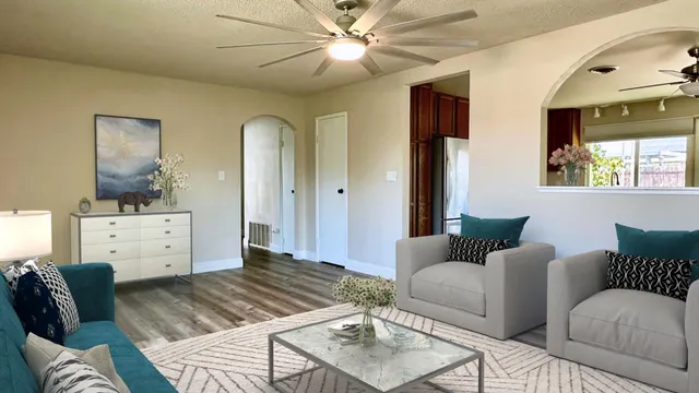 a living room with furniture and a window
