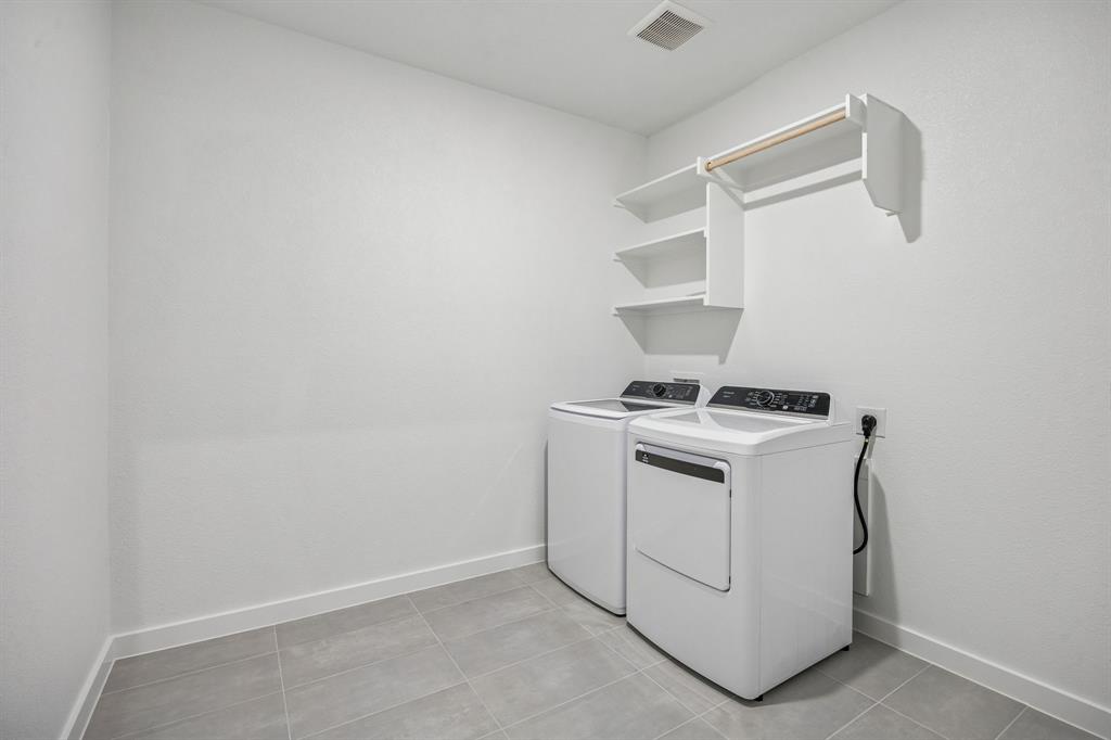 1404 Companero Street Haslet, TX 76052 - Photo 35 of 40 Utility Room in the Wimbledon home plan by Trophy Signature Homes – REPRESENTATIVE PHOTO