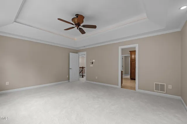 a aerial view of a house with a yard