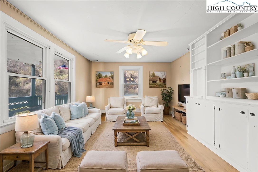 336 Willowdale Church Road Vilas, NC 28692 - Photo 11 of 45 a living room with furniture and a large window