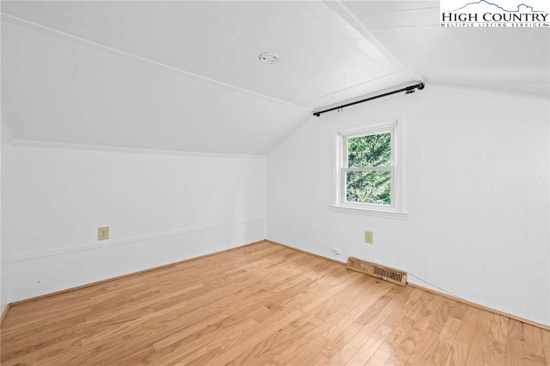 336 Willowdale Church Road Vilas, NC 28692 - Photo 21 of 45 an empty room with a window