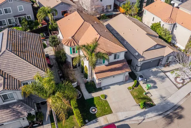 an aerial view of a house with garden