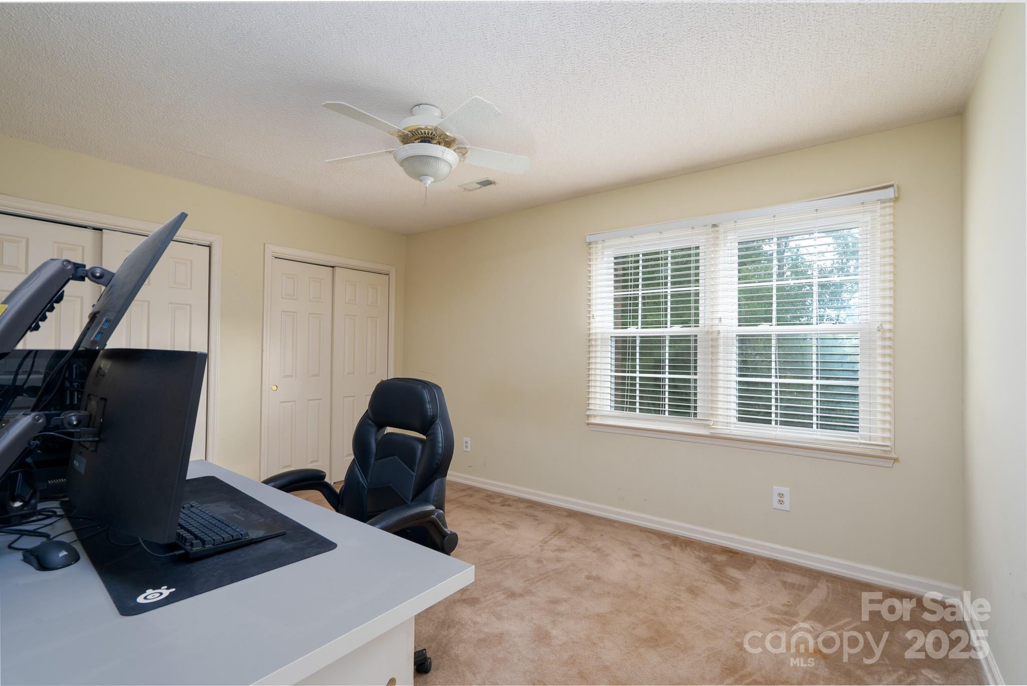 5820 Wingate Way Northwest Concord, NC 28027 - Photo 11 of 14 a view of workspace with windows