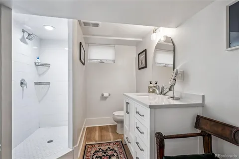 a view of a lake with a house in the background