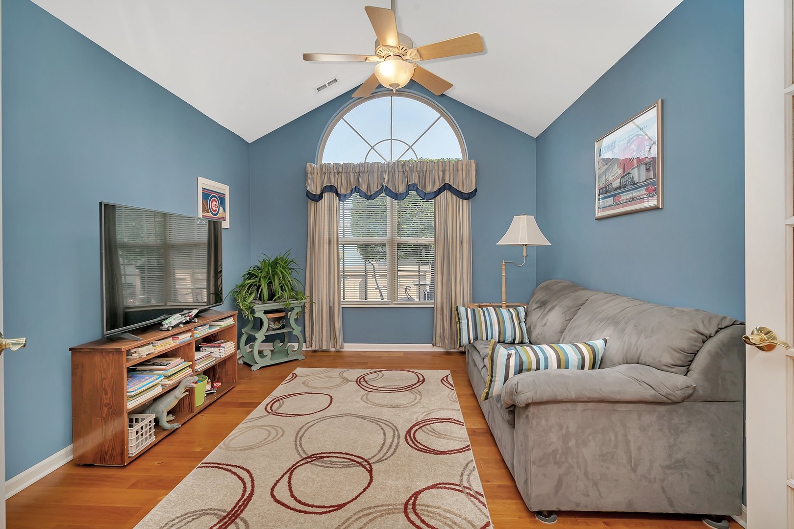 1950 Timbers Edge Circle Joliet, IL 60431 - Photo 12 of 24 a living room with furniture and a flat screen tv