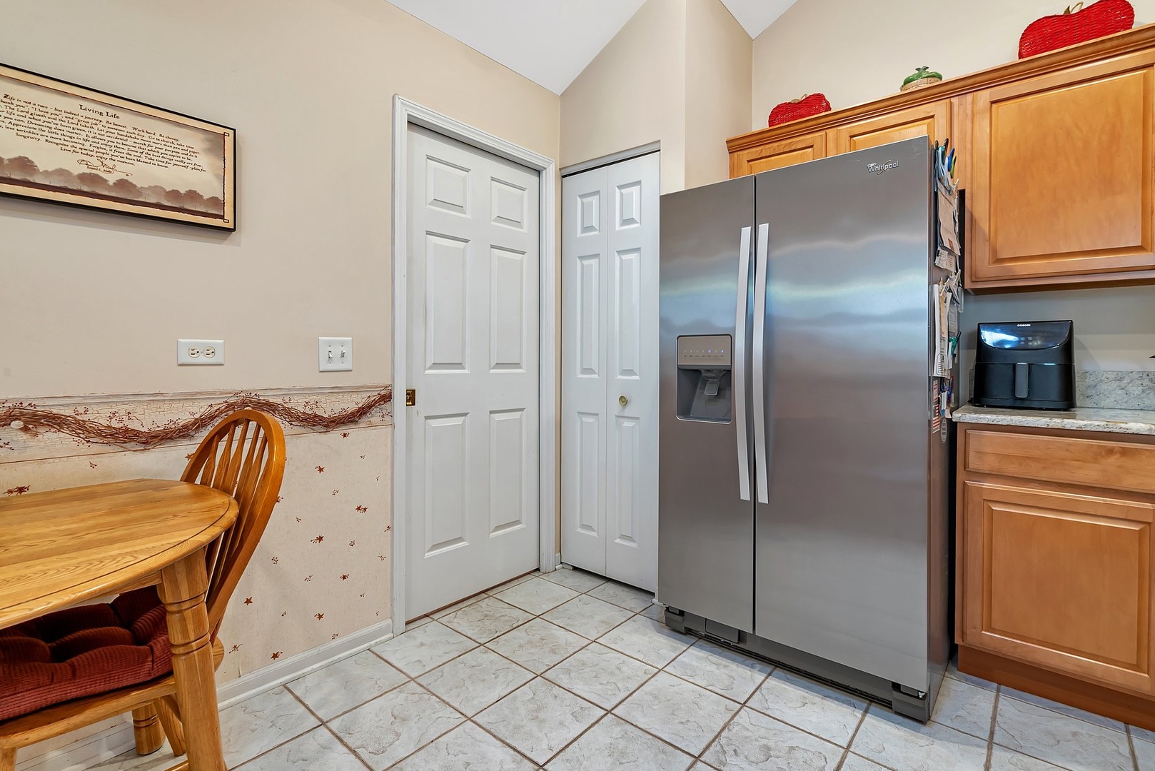1950 Timbers Edge Circle Joliet, IL 60431 - Photo 16 of 24 a kitchen with a refrigerator and cabinets