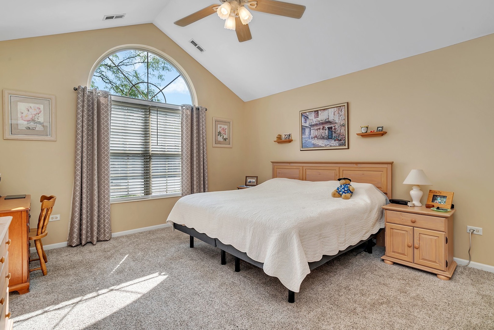 1950 Timbers Edge Circle Joliet, IL 60431 - Photo 18 of 24 a spacious bedroom with a bed a dresser and a large window