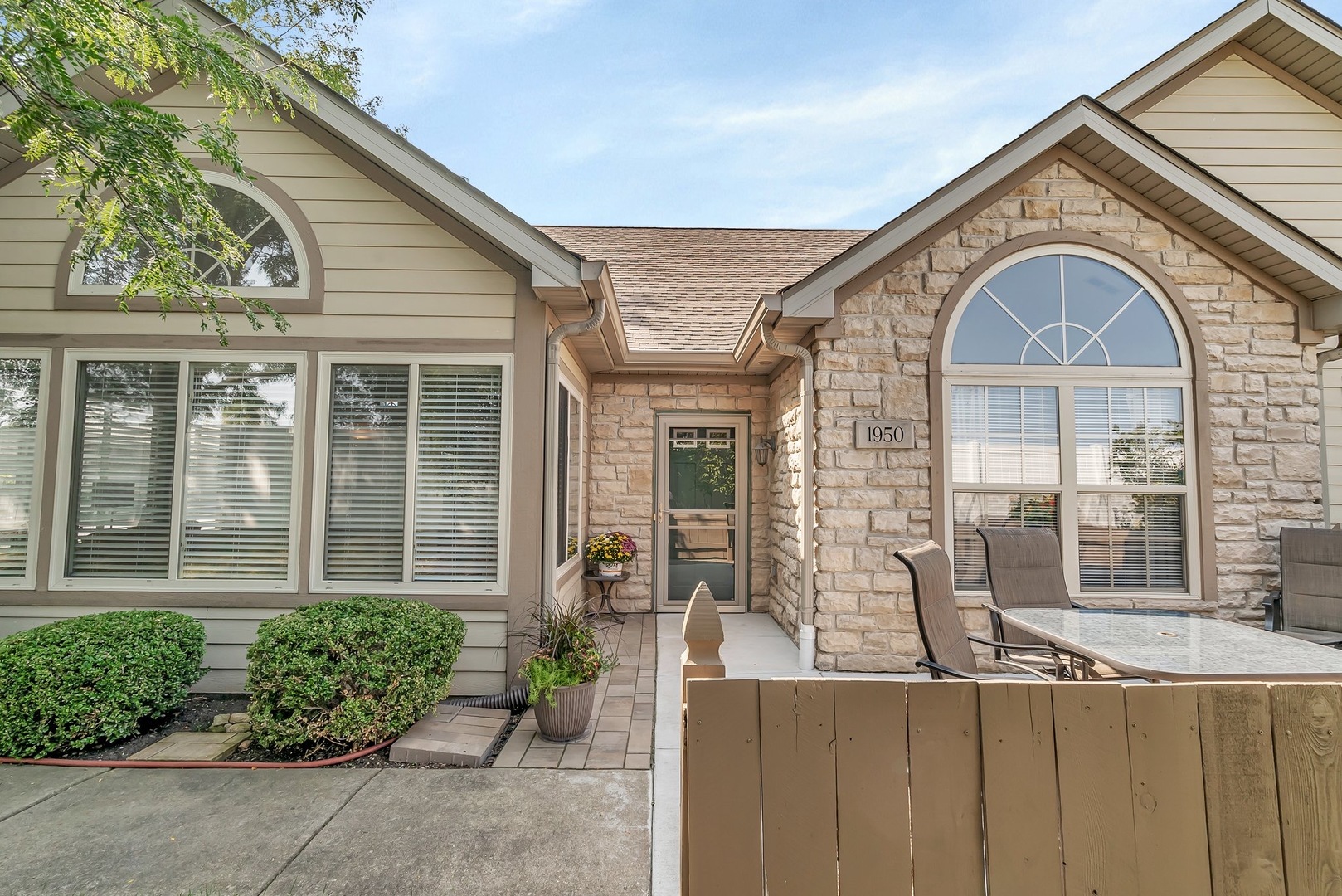 1950 Timbers Edge Circle Joliet, IL 60431 - Photo 3 of 24 a front view of a house with garden