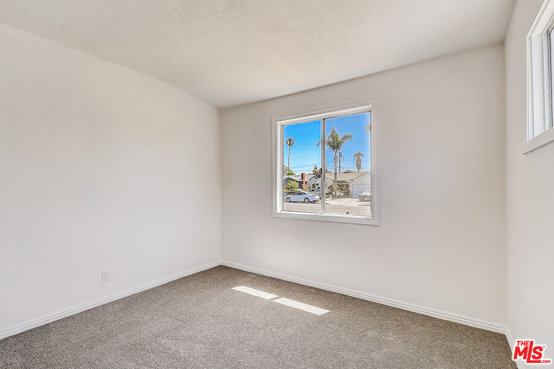 15815 South Haskins Avenue Compton, CA 90220 - Photo 21 of 29 an empty room with windows