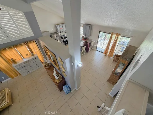 a view of an entryway and livingroom with furniture