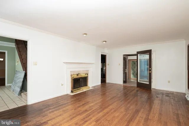 a kitchen with a sink and wooden cabinets