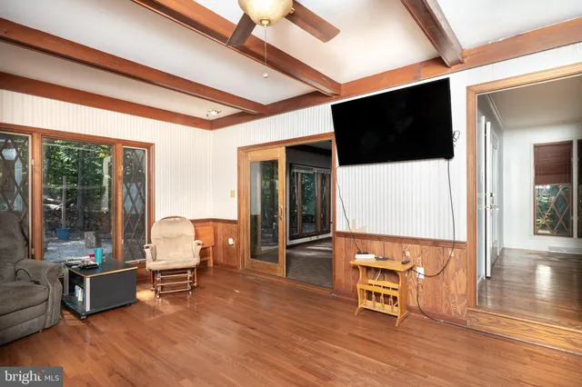 a kitchen with stainless steel appliances granite countertop a refrigerator and a refrigerator