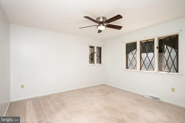 a view of house with yard and entertaining space