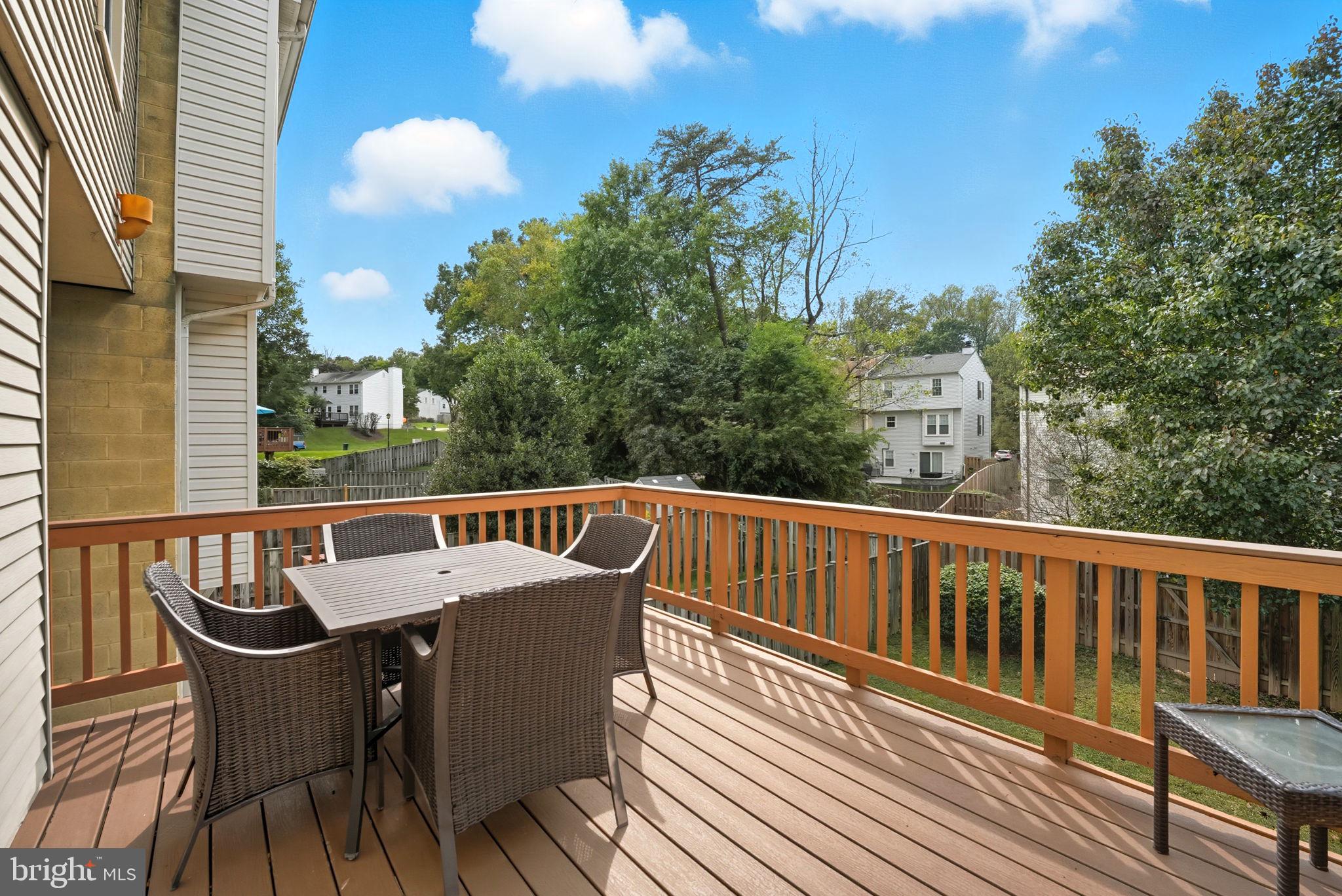7954 Forest Path Way Springfield, VA 22153 - Photo 11 of 34 a view of a deck with wooden floor and fence