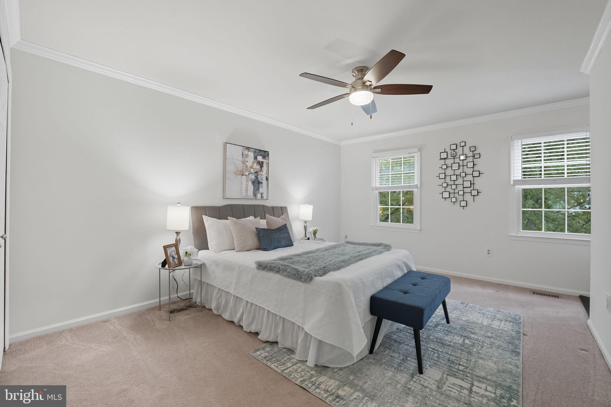 7954 Forest Path Way Springfield, VA 22153 - Photo 13 of 34 a bedroom with a bed and a window