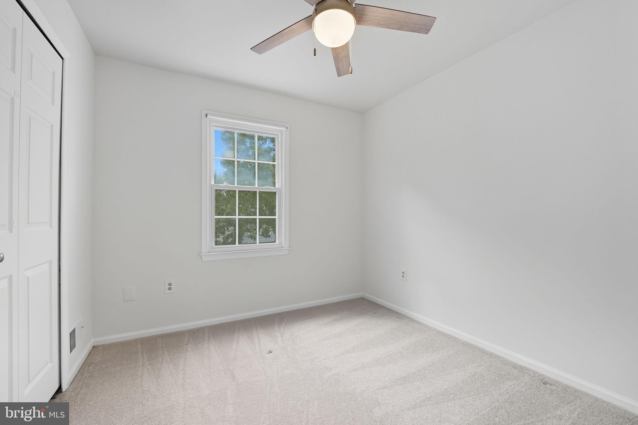 7954 Forest Path Way Springfield, VA 22153 - Photo 19 of 34 an empty room with a window