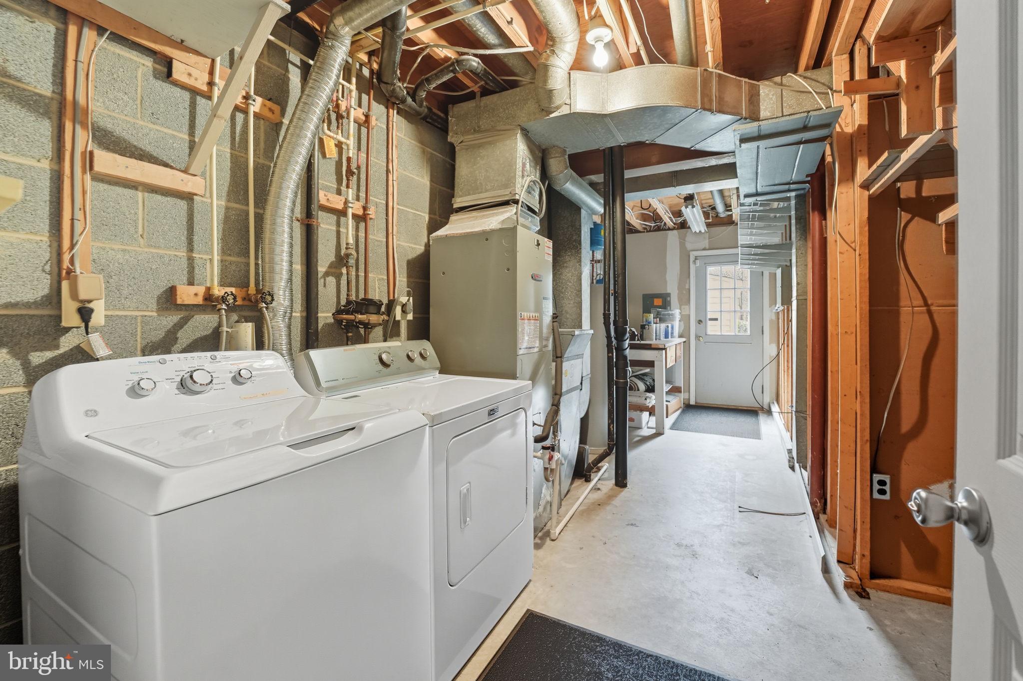 7954 Forest Path Way Springfield, VA 22153 - Photo 29 of 34 a view of a bathroom with a sink and mirror