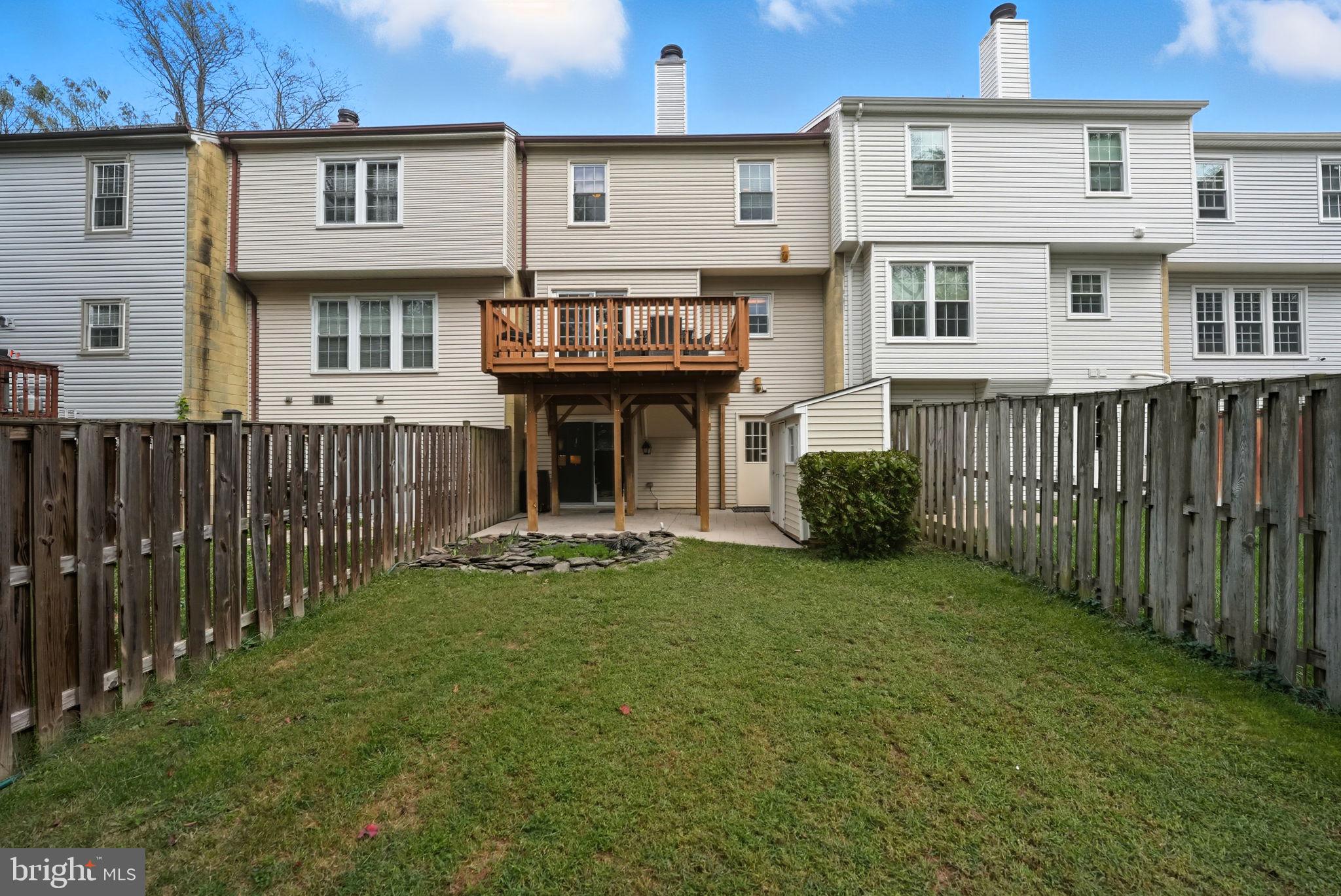 7954 Forest Path Way Springfield, VA 22153 - Photo 33 of 34 a view of a house with backyard and porch