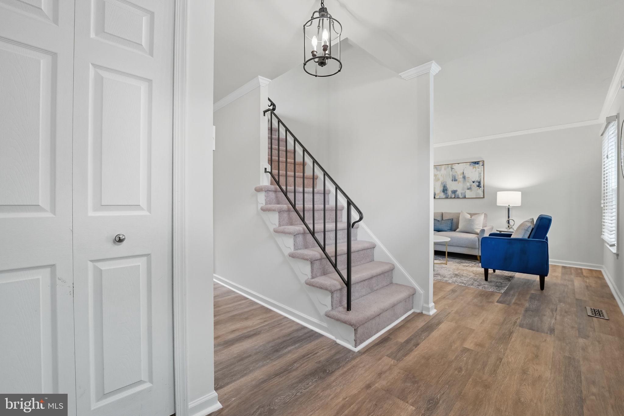7954 Forest Path Way Springfield, VA 22153 - Photo 9 of 34 a view of entryway and hall with wooden floor