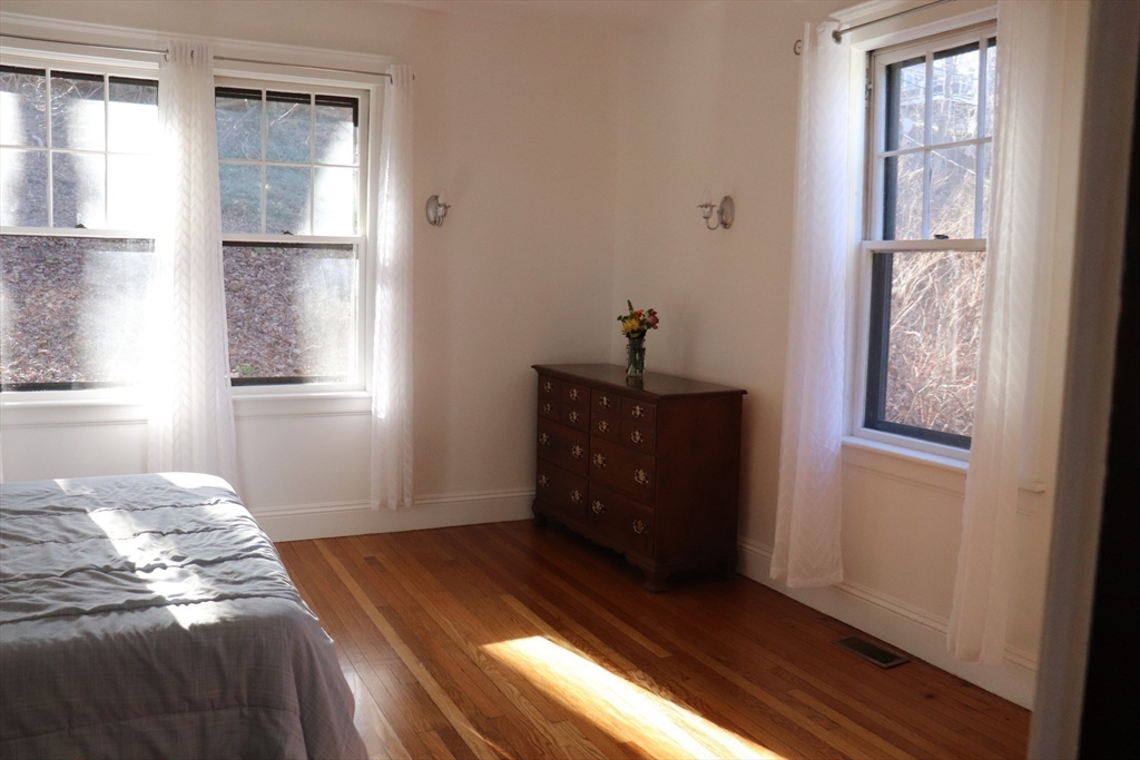 26 St Elmo Road Worcester, MA 01602 - Photo 16 of 42 a bedroom with a bed and a window