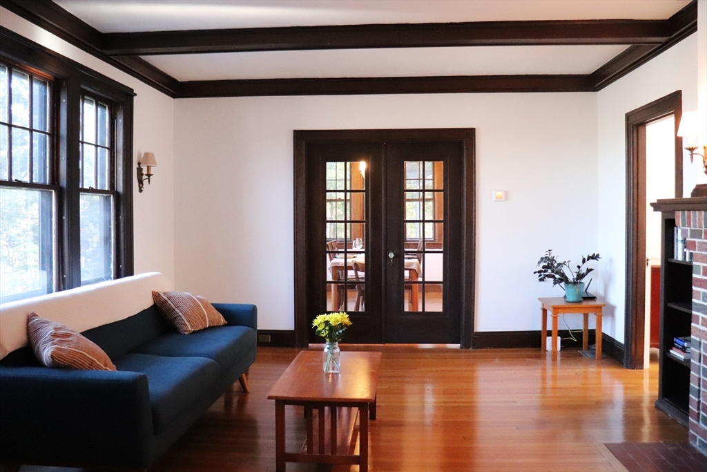 26 St Elmo Road Worcester, MA 01602 - Photo 2 of 42 a living room with furniture and wooden floor