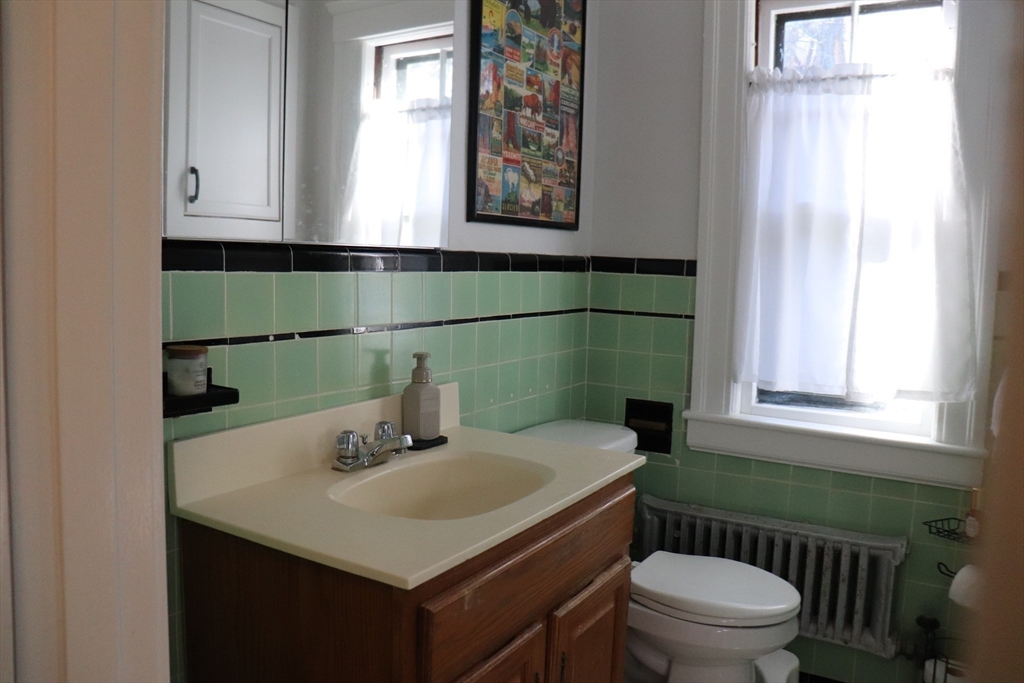 26 St Elmo Road Worcester, MA 01602 - Photo 34 of 42 a bathroom with a sink and a toilet