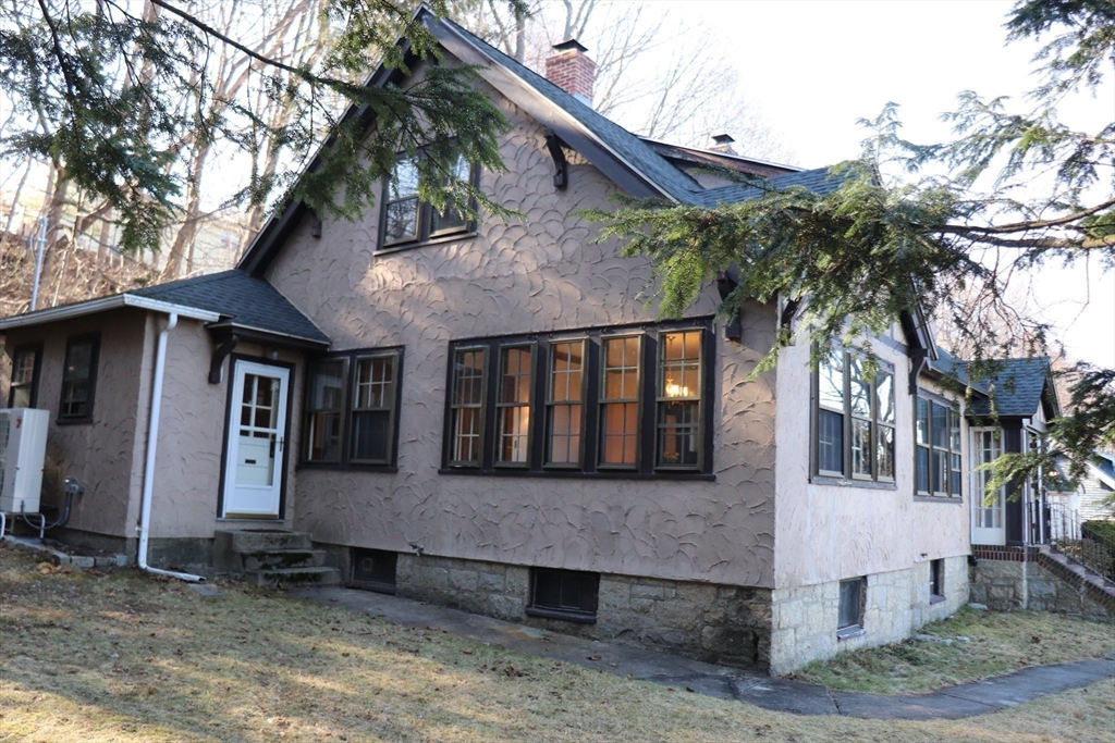 26 St Elmo Road Worcester, MA 01602 - Photo 40 of 42 a front view of a house with a yard