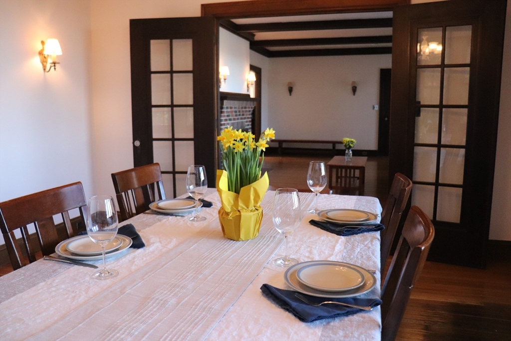 26 St Elmo Road Worcester, MA 01602 - Photo 5 of 42 a dining room with furniture and a wooden floor