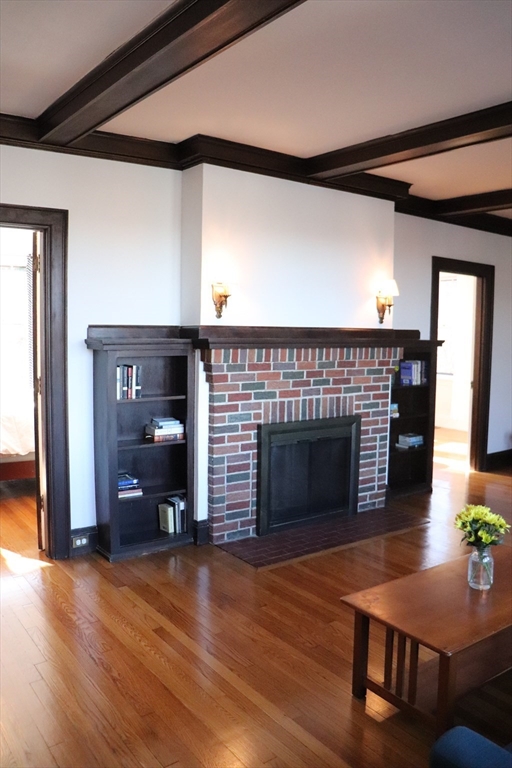 26 St Elmo Road Worcester, MA 01602 - Photo 6 of 42 a living room with furniture and a fireplace