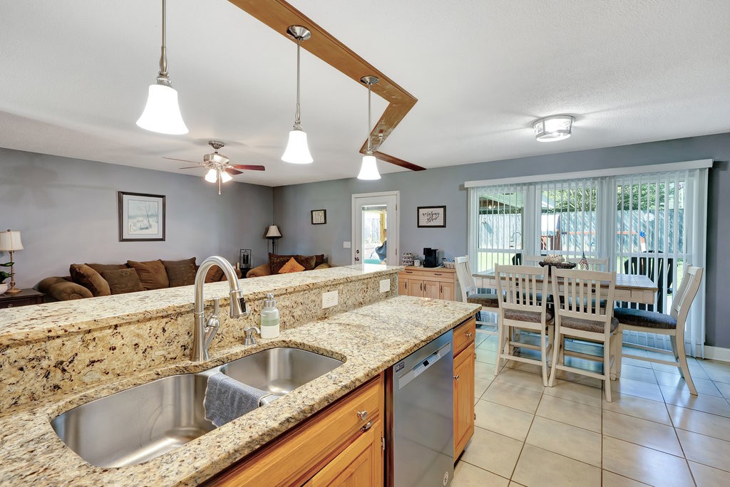 712 Kilgore Street Jasper, TN 37347 - Photo 11 of 58 a kitchen with a sink and a refrigerator