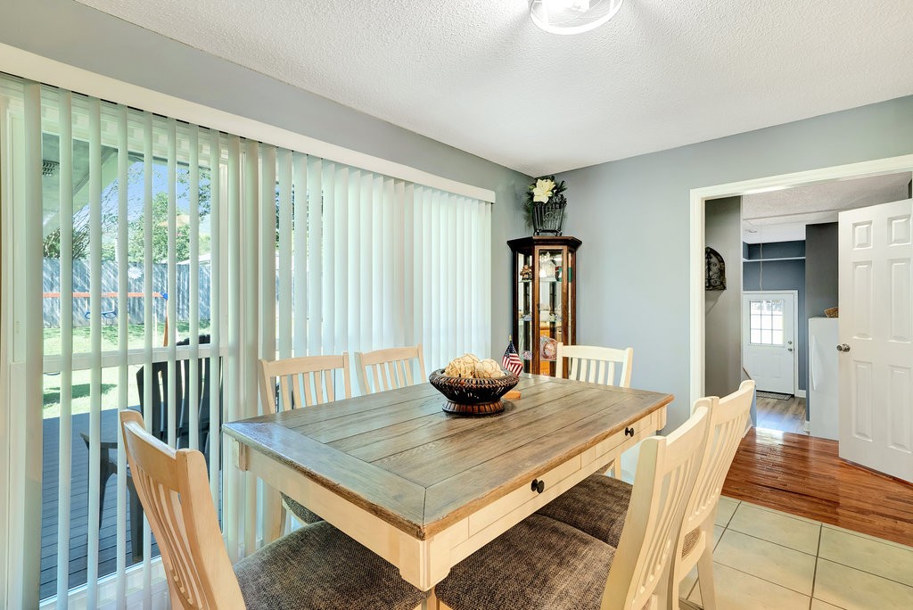 712 Kilgore Street Jasper, TN 37347 - Photo 13 of 43 a view of a dining room with furniture and wooden floor