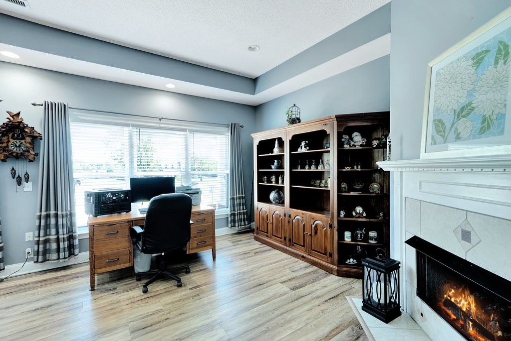 712 Kilgore Street Jasper, TN 37347 - Photo 16 of 43 a view of a workspace with furniture and a window