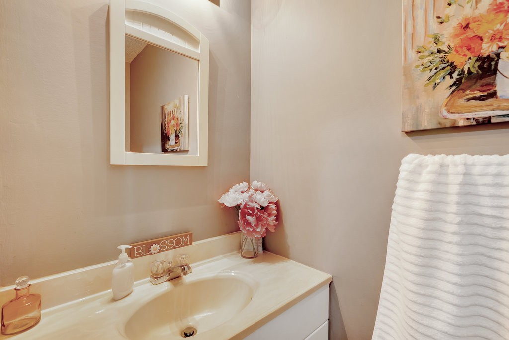 712 Kilgore Street Jasper, TN 37347 - Photo 25 of 43 a bathroom with a sink and mirror with toilet
