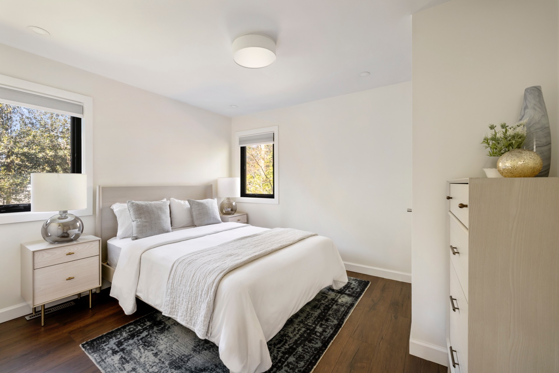 137 North Sea Mecox Road Southampton, NY 11968 - Photo 11 of 16 a bedroom with a bed and wooden floor