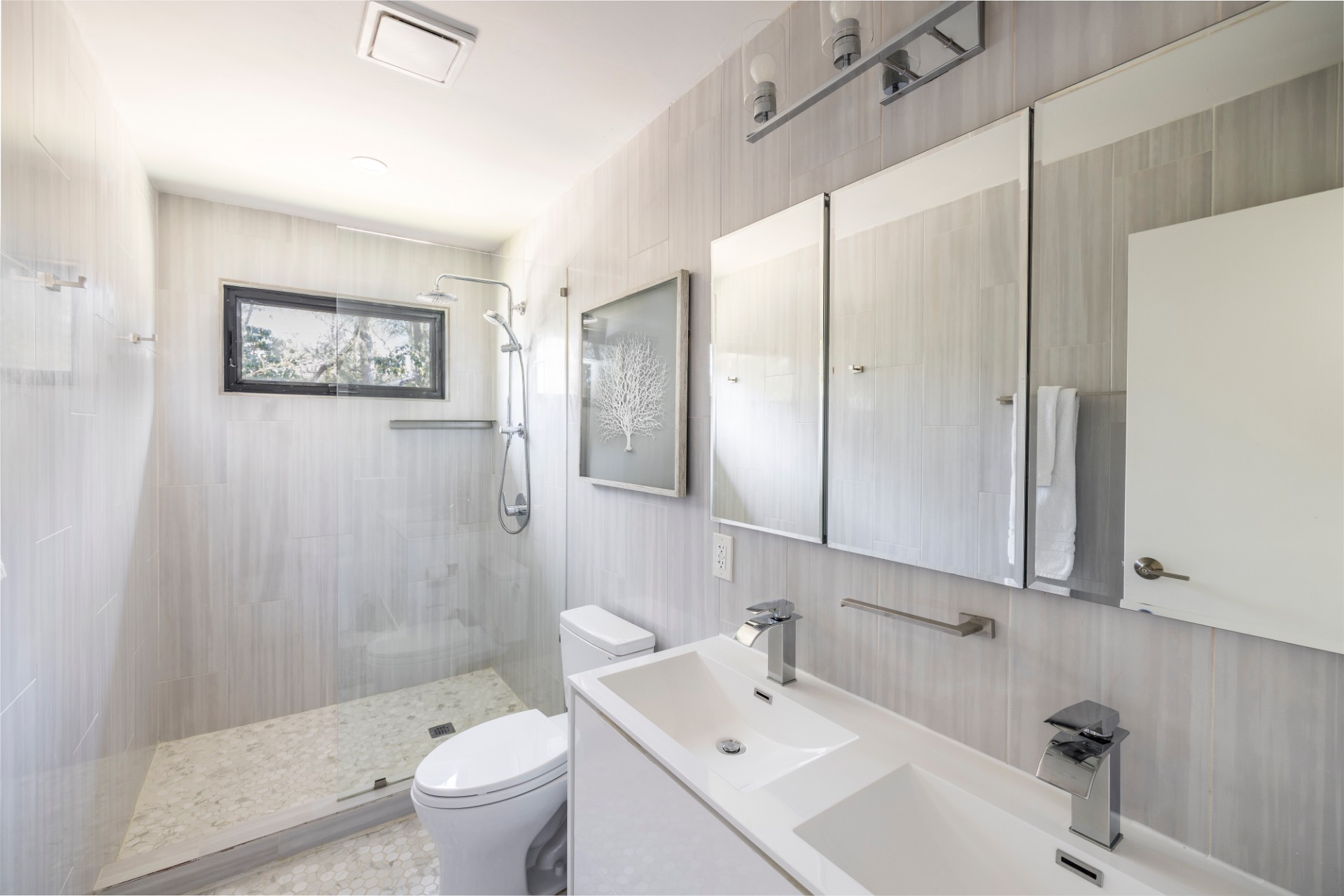 137 North Sea Mecox Road Southampton, NY 11968 - Photo 10 of 16 a bathroom with a sink a toilet and shower