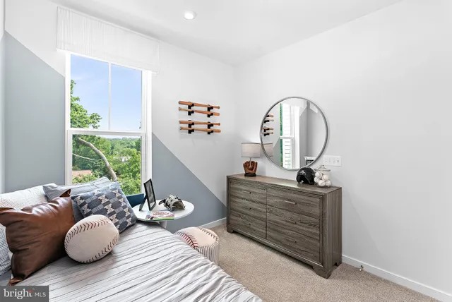 a room with furniture and a window